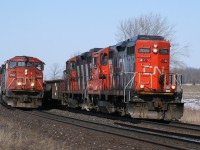 CN 399 (CN 5546) and SOR 598 (CN 7076) pace each other, as they round the curve at Power Line Road just outside of Brantford.