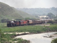 H1b 4-6-4 2816 with a westbound executive special bound for Regina departs from Medicine Hat along Ross Creek