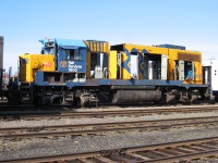 1803 has seen better days.  She now sits skeletonized in the deadline in ONR's North Bay yard.  There are still a few parts left on her that will eventually make to other units, such as the rerailers hanging under the frame just ahead of the fuel tank.