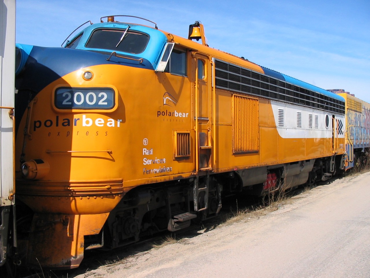 ONR 2002 sits coupled to its sister 2001 on a stub track at the diesel shop on this sunny spring morning in North Bay, ON.  Neither one of these diesels would do much if anything else after this date.