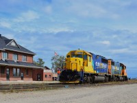 The crew of GP38-2 #1808 and SD40-2 #2200 have just yarded their freight train and are moving the power to the far track in front of the Cochrane station where the units will be parked until they are moved to the shop area 45 minutes later.