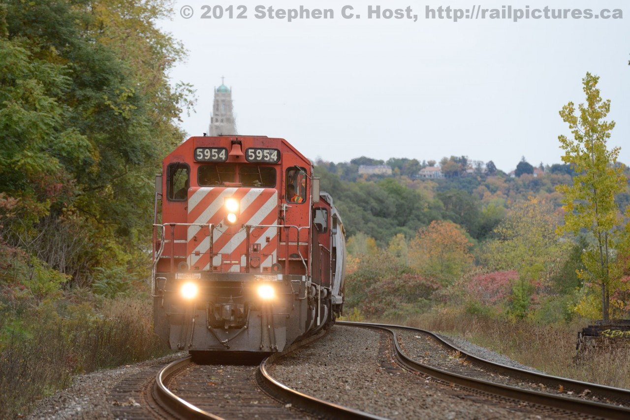 CP's Ham Turn, now sporting a pair of SD40-2's is heading north on the Hamilton Sub - in the background you see the Hamilton Escarpment and the Catholic Diocese of Hamilton's spire