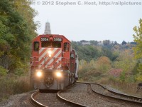 CP's Ham Turn, now sporting a pair of SD40-2's is heading north on the Hamilton Sub - in the background you see the Hamilton Escarpment and the Catholic Diocese of Hamilton's spire