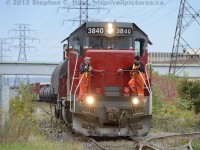 The crew on NECR 3840 share a laugh while discussing switching (I believe one crew was a Trainee) at the CP/CN (SOR) Interchange in the heart of industrial Hamilton, Ontario.