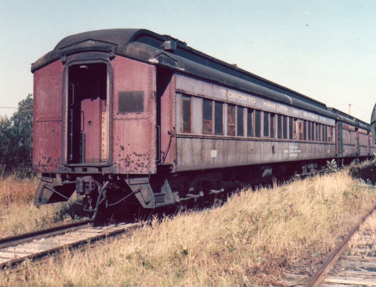 While it may not look like it, this bunk car was still in service and was a home-on-the-road for members of the TH&B wrecking crew.  This coach along with several others were stored 'ready to go' at TH&B's Aberdeen Avenue yard in this mid-1974 photo.