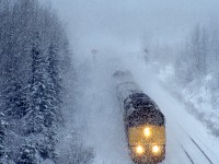 Eastbound train #2 The Canadian rolls through a mid October snow storm