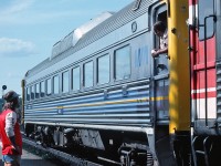 The operator and trainman talk for a bit before heading westward.