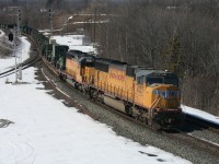 CN X350, a military train returning Canadian Forces equipment from training excercises in Texas.  Rolls through Bayview with UP 4337 and UP 3620 running ten minutes beind CN X150