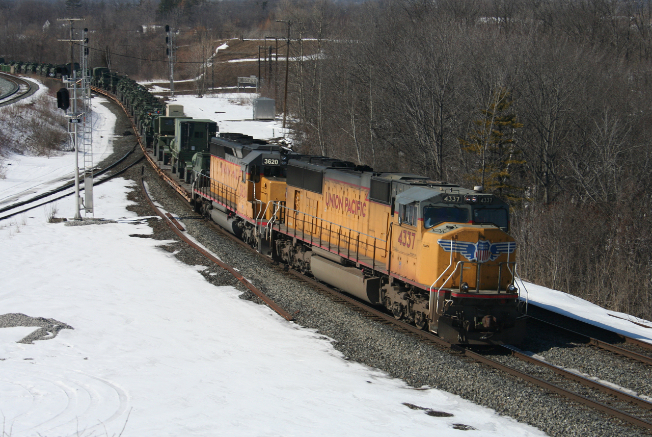CN X350, a military train returning Canadian Forces equipment from training excercises in Texas.  Rolls through Bayview with UP 4337 and UP 3620 running ten minutes beind CN X150