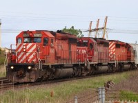 Train 421 heads into Windsor with CP 6043, STLH 5651 & CP 5949 with 61 cars in tow.