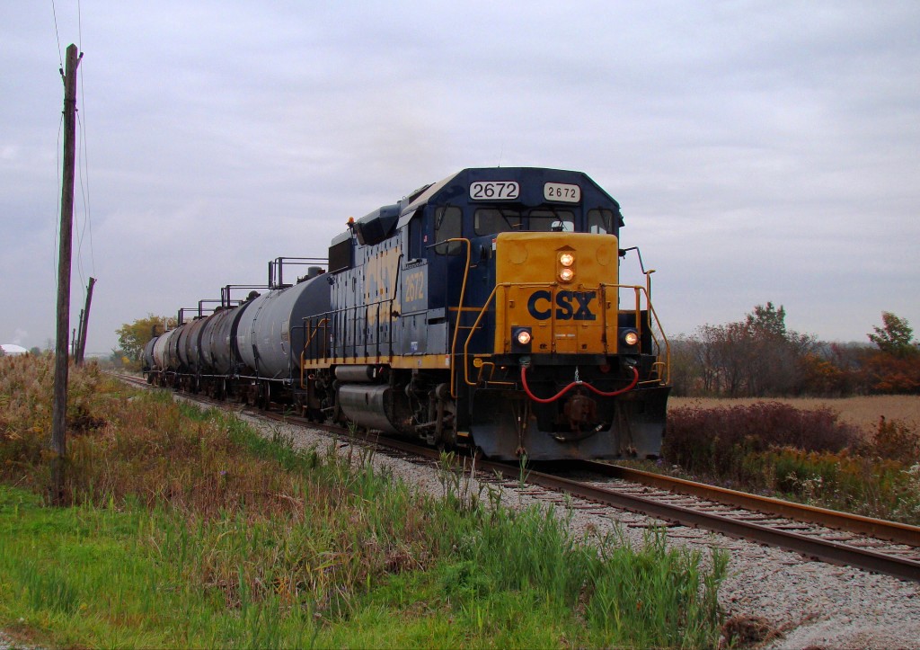 CSX train D924 heads south with six tank cars enroute to Wallaceburg where he will pick up four loaded grain hoppers.