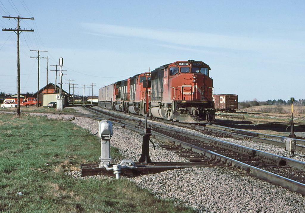 CN 233 comes to a stop on the siding to let the 312 pass by.