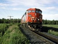 CN 205 rounds the curve at a good speed well equipped in power.