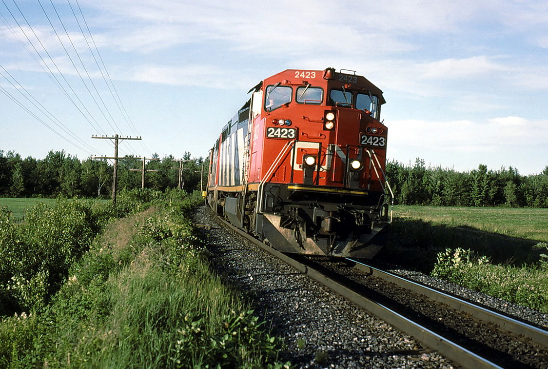 CN 205 rounds the curve at a good speed well equipped in power.