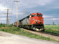 CN 309 with horns blaring at full blast,.