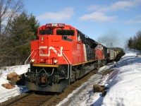 Brand new CN 8004 and CN 5718 accelerate train 201 north after a brief a crew change.