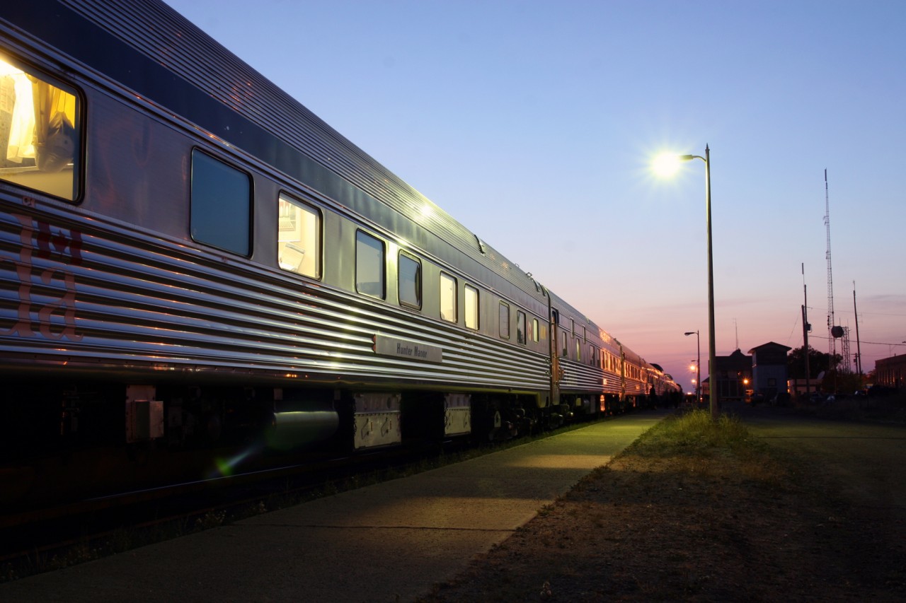 Despite running an hour late, VIA #1 still performs its scheduled smoke stop at Saskatoon on a clear autumn night.