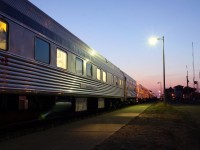 Despite running an hour late, VIA #1 still performs its scheduled smoke stop at Saskatoon on a clear autumn night.