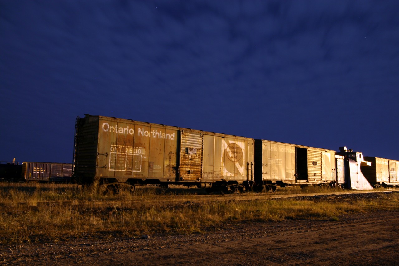 On the night before the last Northlander runs, stored equipment languishes at the Cochrane Shops in the night light. Thanks to ONR for the permission and the experience.