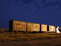 On the night before the last Northlander runs, stored equipment languishes at the Cochrane Shops in the night light. Thanks to ONR for the permission and the experience.