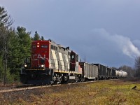 CN 595 briefly escapes the clouds and squalls as it approaches the Old Muskoka Road crossing in Allensville.
