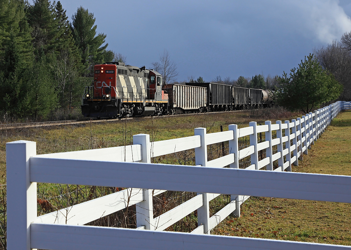 595 returning from Washago/Longford Mills passes by Mile 138 minutes after a snow squall had laid a dumping on the place, all of which disappeared as soon as the sun came back out.