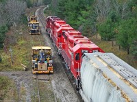 Delayed T07 races with engineering services on the siding in Pontypool Ontario.