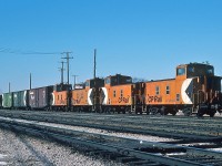 Four end of train devices – including CP Rail 434060 - on the tail end of the 8921-8769 powered westbound transfer. February 1, 1980 Kodachrome by S.Danko.