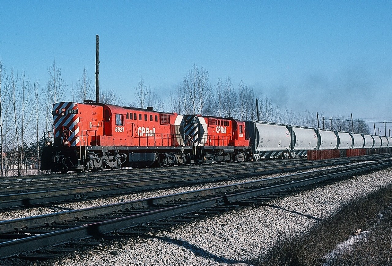 THE 8921 – the one and only MLW RSD-17 - is assisted by 8769 (MLW RS-18) on a February 1, 1980 transfer, westbound leaving Agincourt. The 2400 rated horsepower RSD-17 typically handled such transfers single handedly. Kodachrome by S.Danko.