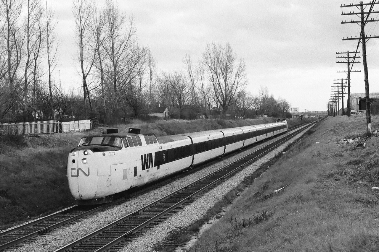 A daily common sight, Via CN Rail Train #66 on the approach to Scarborough Junction. The Montreal-Toronto Turbo was twice daily - each direction - in 1978. And fast. Tri X negative by S. Danko.