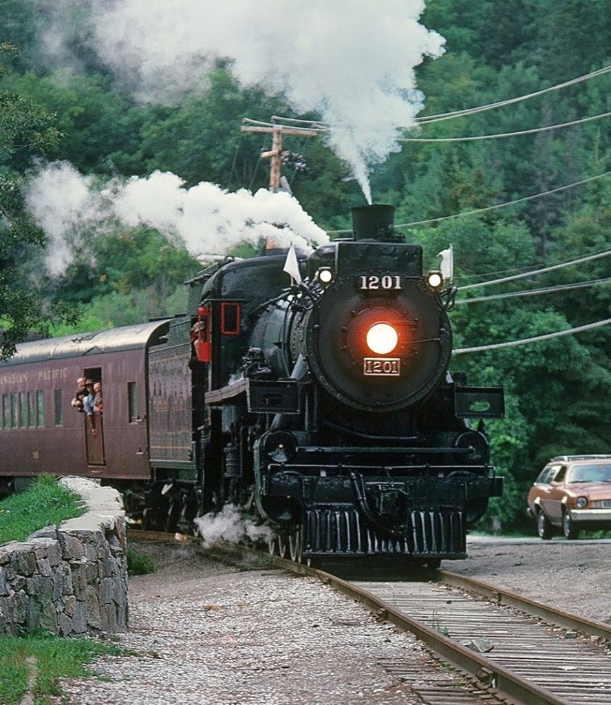 Ex CPR G5a #1201 is working the CP Rail Maniwaki Subdivision for the regularly scheduled National Museum excursion train to Wakefield, P.Q. Perhaps a viewer can identify the exact location. And that is a Ford Pinto on the right. I understand the 1201 has remained in a shed behind the museum – for over 25 years! August 25, 1979 Kodachrome by S. Danko.