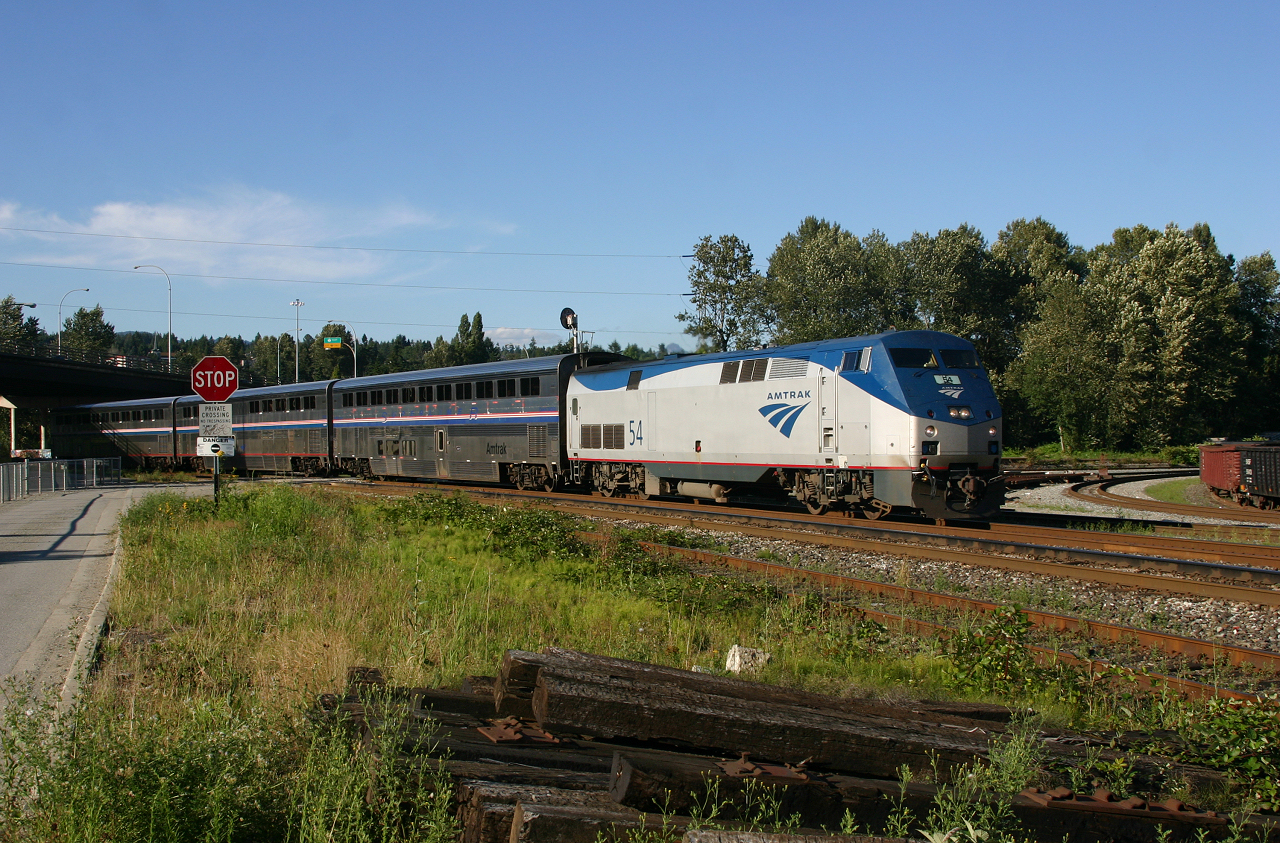 The evening Amtrak Cascades train 517 rolls through the BNSF Yard at New Westminster with a P42 and three Superliners filling in for the Talgo equipment