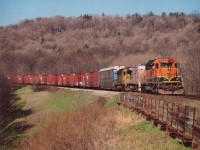 From the days of "CN Colour" comes an all BNSF family leading CN#394 on approach to Mile 2 Dundas Sub. Power is BNSF 7005, 563 and 6871.