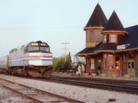 AMTK #98 with 341 slows to a stop at Grimsby Station, as quaint as a movie setting this place was until it was destroyed by an electrical fire on New Years Day, 1991.