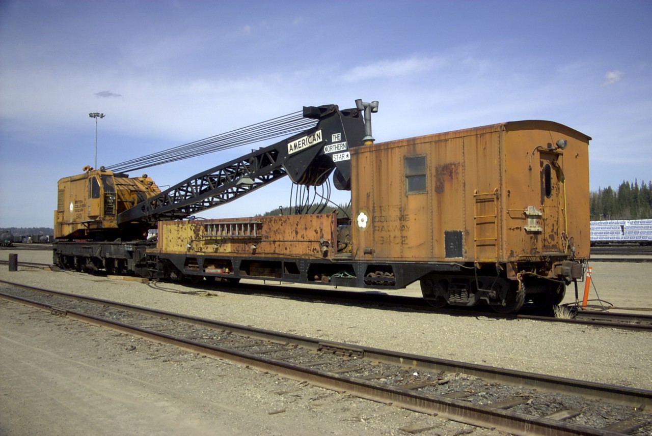 BCR 6401 'The Northern Star' is an American model W-150 wrecking crane s/n W-3854. It was built new in 1969 for Pacific Great Eastern Railway and shipped to them in November of that year.  Powered by a Detroit Diesel 8V-71, it produced 284 h.p. @ 2100 rpm. The crane is equipped with a 40 foot boom and 5 foot jib and has a self-propelled travel speed of 2-3 mph.  After CN's acquisition of BC Rail, both the crane and boom idler/cabin car were shipped to a local scrap dealer and scheduled to be destroyed but a concerted effort by the PG Railway & Forestry Museum and a few other folks saved them from the torch and they are now on display at the museum.  The crane was fully operational when it was taken out of service.