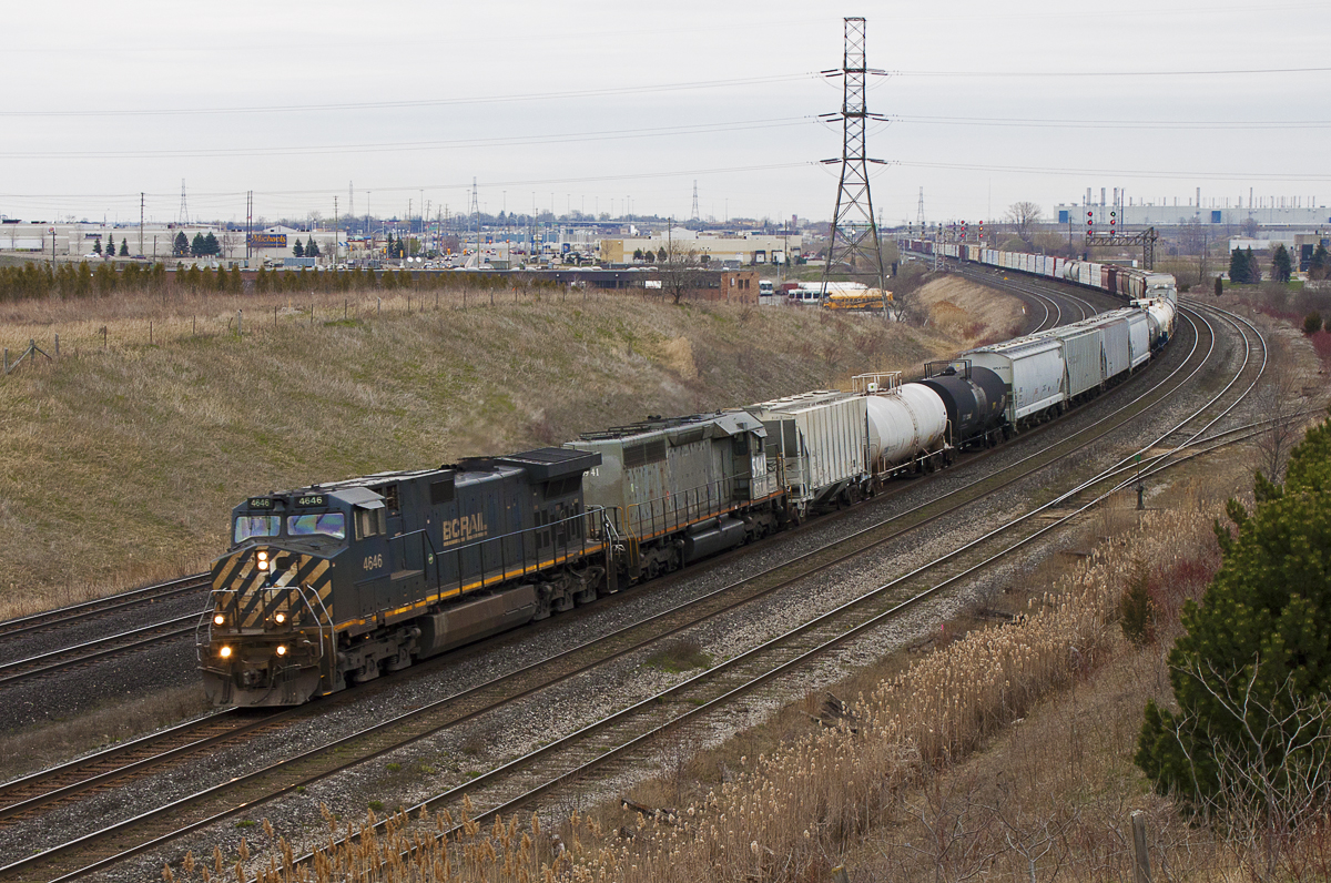 369 rounds the bend at Gerdau with an interesting consist.