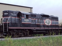 Cando's Barrie Collingwood Railway CCGX #1001 'Spirit of Collingwood' moves a cut of cars down the line near the railways maintenance shop outside of Utopia.  It's nice to see a Geep with its high short hood still in place.  David Wylie photo submitted with permission.