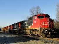 CN 2186 leads CN 5676 BCOL 4602 and QGRY 3347 through Beachville Ontario. A LORAM grinder is also just behind the units.