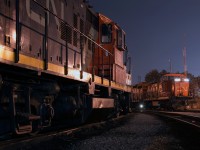 The humming of GP9's and a GMD1 echo's through out the yard on this somewhat warm November evening, the crew on 556 has parked on the back lead and gone in for lunch after pulling and spotting the Ford plant earlier on.