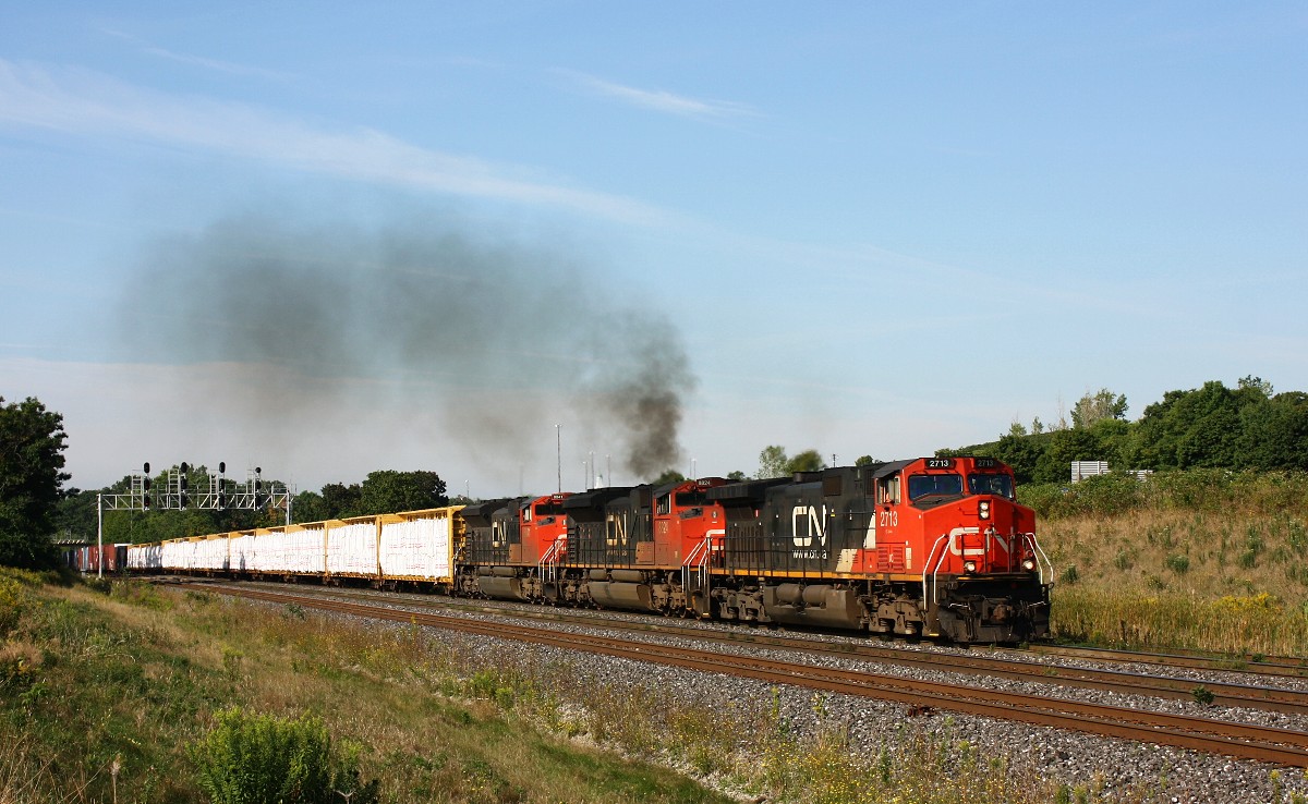 CN 422 is working hard through Snake as 8824 puts on a show for us. Not a regular occurrence with EMD's.