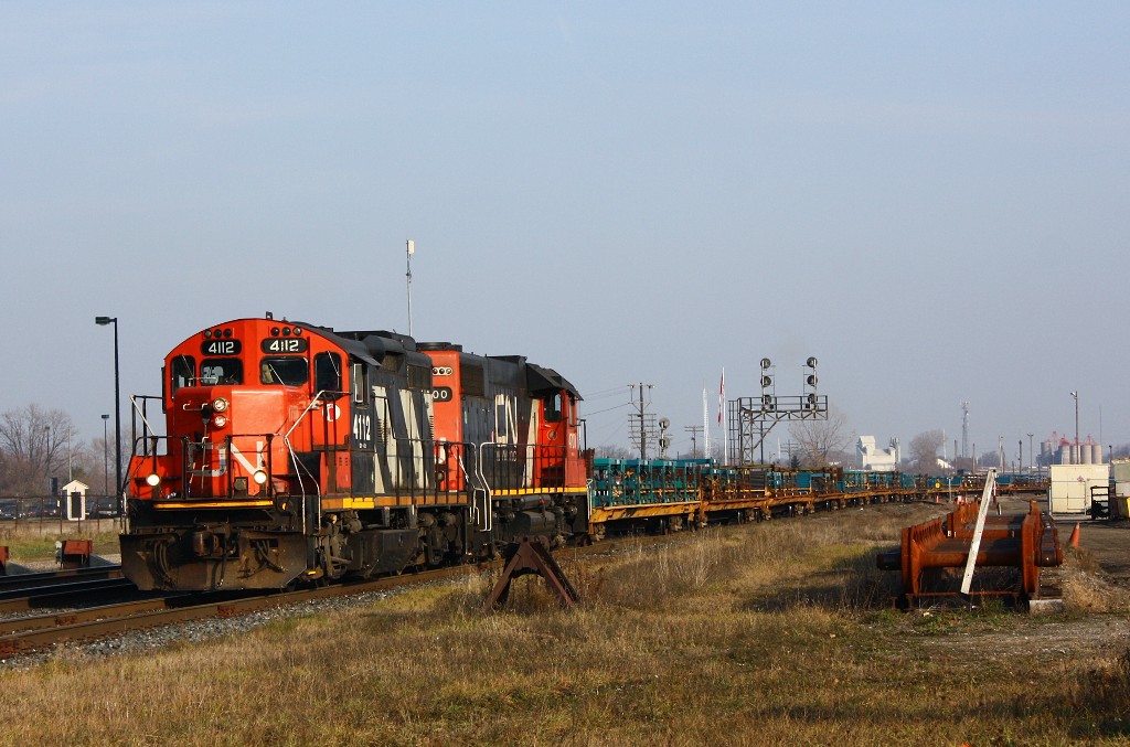 CN 584 starts down the CN Talbot Spur en route to St. Thomas with frame cars for Formet.