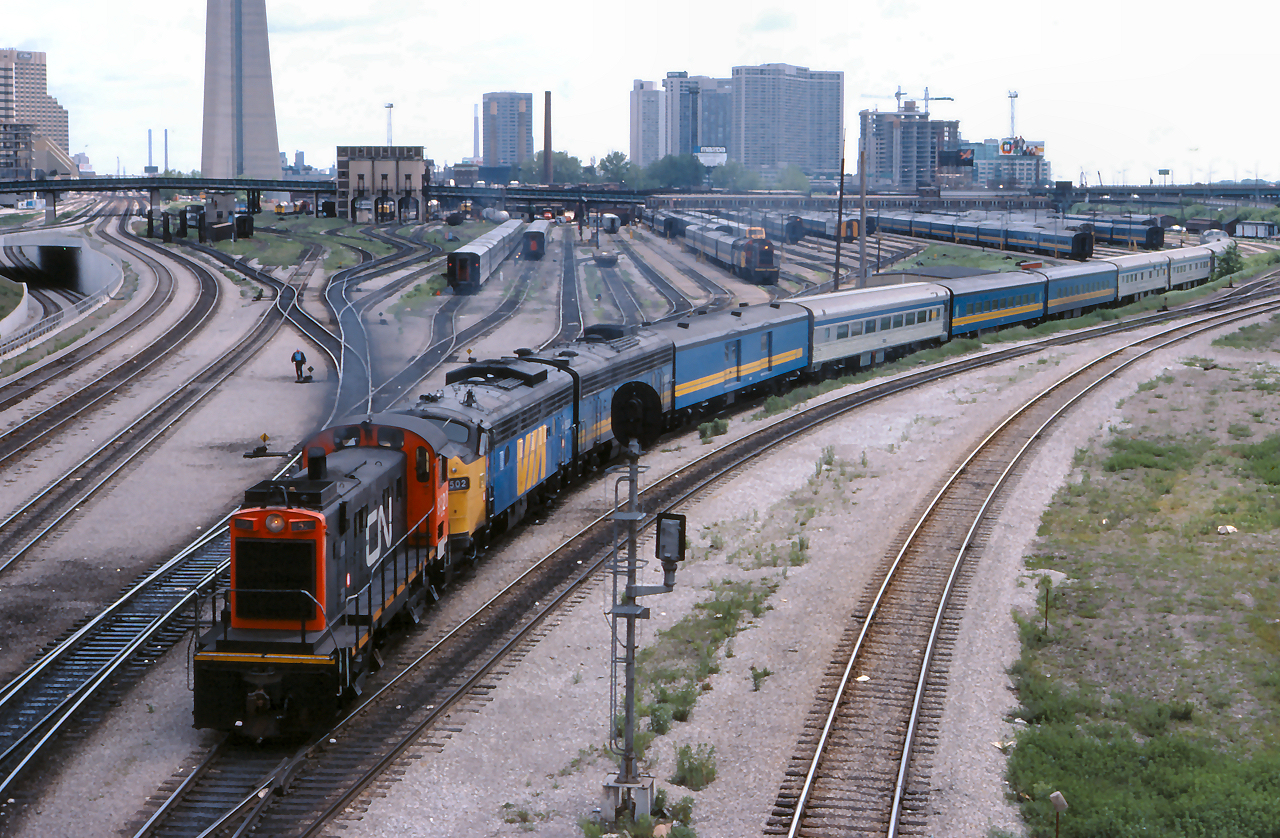 CN 8520 pulls The Canadian out of the coach yard before shoving it to Union Station prior to its cross country journey