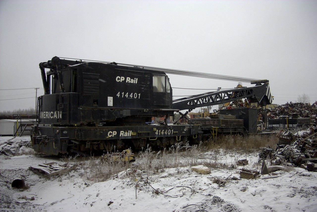 It's a sad day for CP 414401 as it sits in line at Mandak Metals Selkirk, MB facility waiting to be cut up for scrap.  This American W-150 was built new in 1967 so compared to most wrecking cranes, it is meeting a very early fate at just 35 years old.