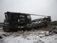 It's a sad day for CP 414401 as it sits in line at Mandak Metals Selkirk, MB facility waiting to be cut up for scrap.  This American W-150 was built new in 1967 so compared to most wrecking cranes, it is meeting a very early fate at just 35 years old.