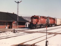 
Guelph Jct was not the same after the agent and the station disappeared in the later 1980s. In this view one can see the orders up by hoop as CP 5528, 5508 passes westbound on a nice cool March morning.That white on purple porcelain namesign is a treasure too.  I have often wondered where it ended up.