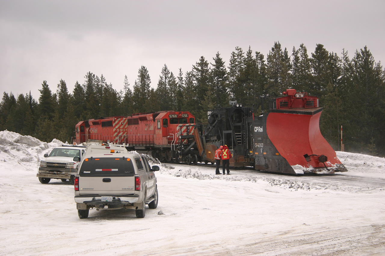 As the military and Parks Canada prepare to shoot shoot the avalanche paths on Kicking Horse Pass, CP crews prepare the spreader and plow to clear the mainline should it be fouled by a possible avalanche.