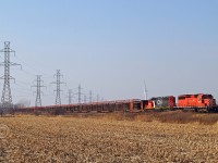 With the welded rail train at capacity, CP 6030 with CN 5937 prepare to move eastward to Chatham. Here the locomotives will be cleaned and serviced before returning with an empty train. The rail has been lifted, with the exception of road crossings, as far east as mile 202.38 on the CASO Sub. Work resumes tomorrow.
