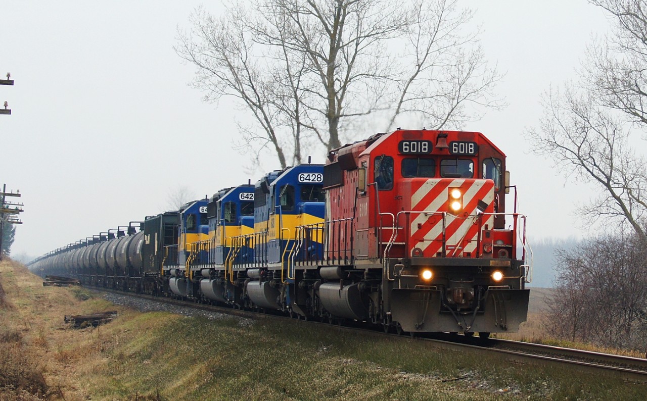 CP 644 with CP 6018 and ICE 6428 6426 and 6451 rolls through the countryside heading to Woodstock Ontario