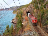 CP 8636 and 8808 haul Regina to Albany crude oil train 608 through the curves and tunnels along the rugged shore of Lake Superior's Nipigon Bay.