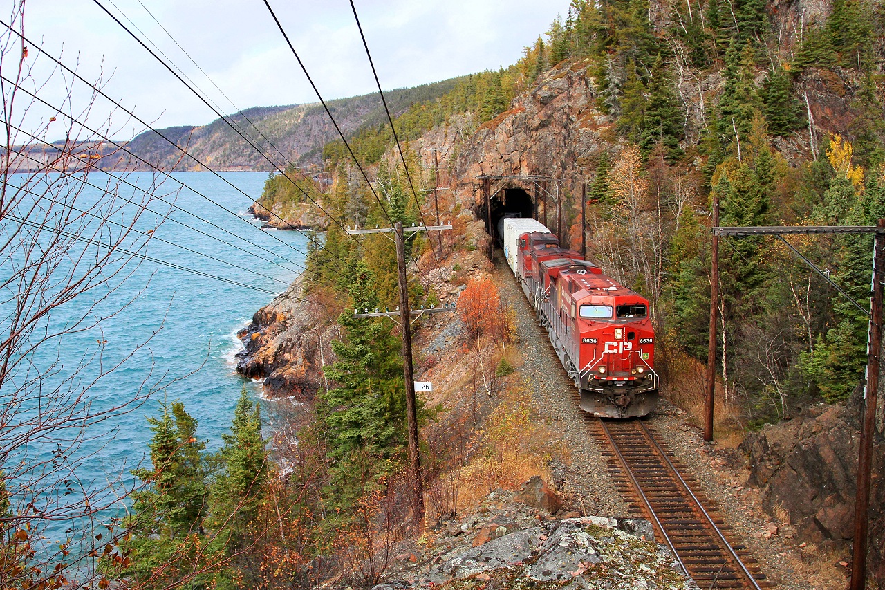 CP 8636 and 8808 haul Regina to Albany crude oil train 608 through the curves and tunnels along the rugged shore of Lake Superior's Nipigon Bay.